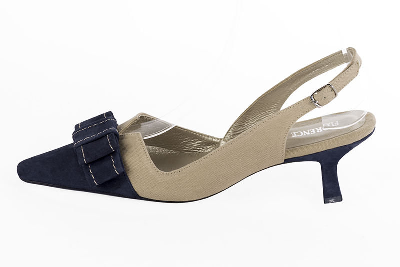 Navy blue and tan beige women's open back shoes, with a knot. Tapered toe. Medium spool heels. Profile view - Florence KOOIJMAN